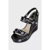 Black leather wedge sandals
