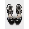 Black leather wedge sandals