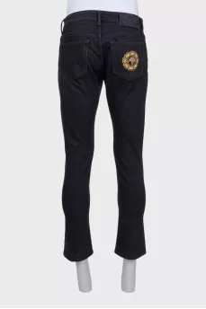 Men's jeans with embroidered logo on the pocket