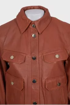 Brown leather jacket with gold buttons