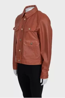Brown leather jacket with gold buttons