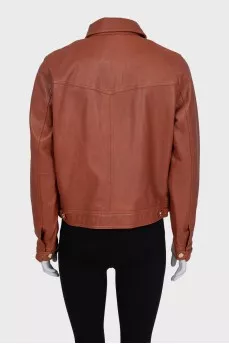 Brown leather jacket with gold buttons