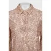 Pink suit decorated with sequins