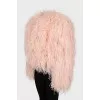 Pink jacket decorated with feathers