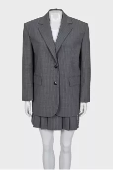 Pinstripe suit consisting of a jacket and skirt