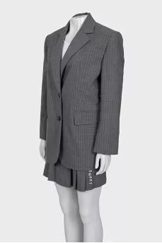 Pinstripe suit consisting of a jacket and skirt