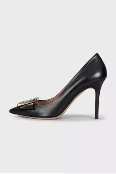 Black leather shoes with decor