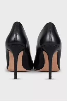 Black leather shoes with decor