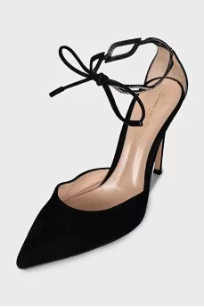 Black suede shoes decorated with rhinestones