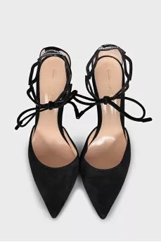 Black suede shoes decorated with rhinestones