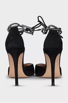 Black suede shoes decorated with rhinestones