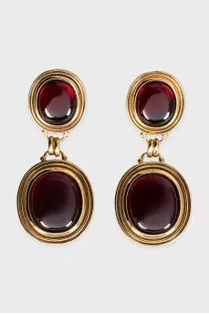 Gold earrings with massive pendants