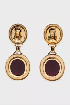 Gold earrings with massive pendants
