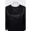 Black silk dress with a straight cut
