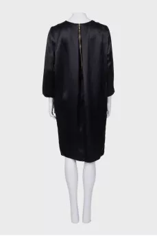 Black silk dress with a straight cut