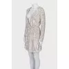 Dress with a cutout decorated with sequins