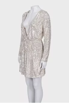 Dress with a cutout decorated with sequins