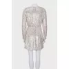 Dress with a cutout decorated with sequins