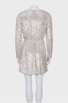 Dress with a cutout decorated with sequins