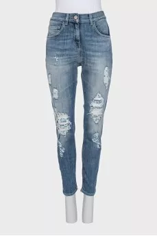 Skinny jeans decorated with mesh