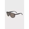 Gray sunglasses with clear frames