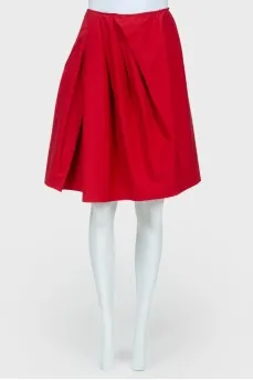 Asymmetric pleated skirt