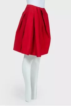 Asymmetric pleated skirt