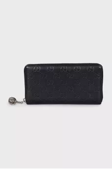 Black leather wallet with branded embossing