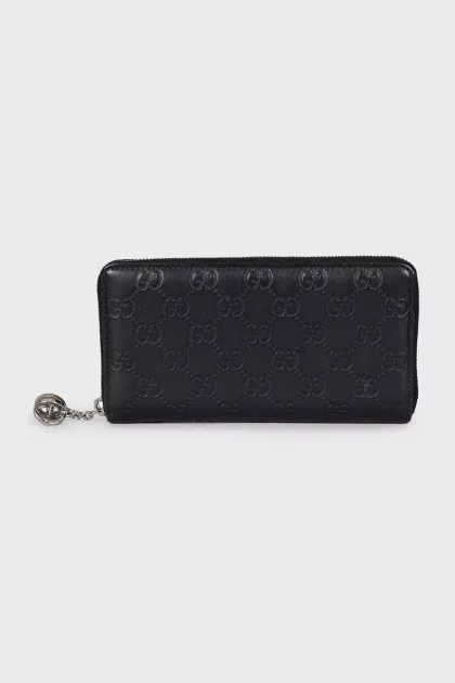 Black leather wallet with branded embossing