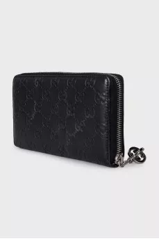 Black leather wallet with branded embossing