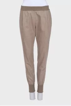 Brown tapered trousers with elastic waistband