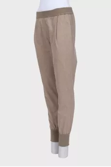 Brown tapered trousers with elastic waistband