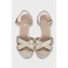 Gold leather wedge sandals