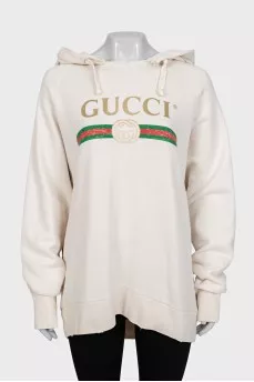 Hoodie with a ripped effect and embroidered details