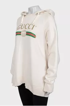Hoodie with a ripped effect and embroidered details