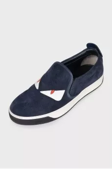 Men's suede slip-ons decorated with studs