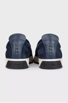 Men's suede slip-ons decorated with studs