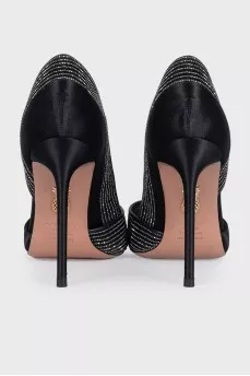 High-heeled shoes decorated with crystals