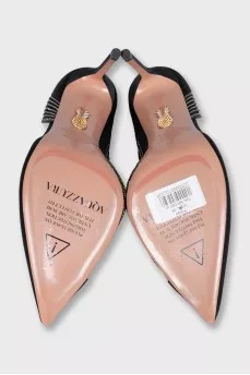 High-heeled shoes decorated with crystals