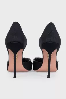 Black textile shoes with a decorated toe