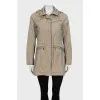 Long windbreaker with a removable hood