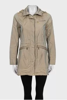 Long windbreaker with a removable hood