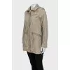Long windbreaker with a removable hood