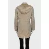 Long windbreaker with a removable hood