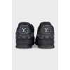 Men's black sneakers with logo