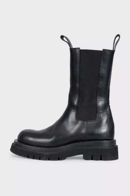 Black leather high boots