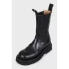 Black leather high boots