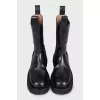 Black leather high boots