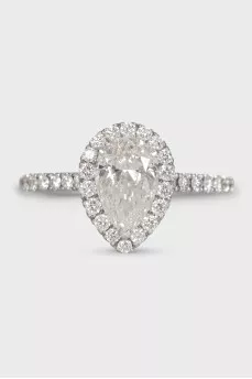 White gold ring with a pear-shaped diamond