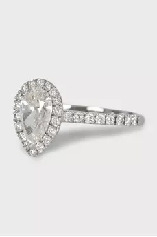 White gold ring with a pear-shaped diamond